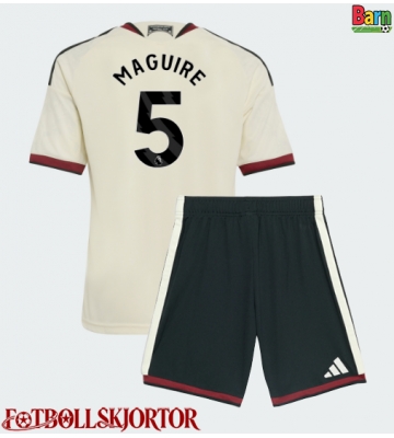 Manchester United Harry Maguire #5 Tredje Kläder Barn 2026-27 Kortärmad (+ Korta byxor)